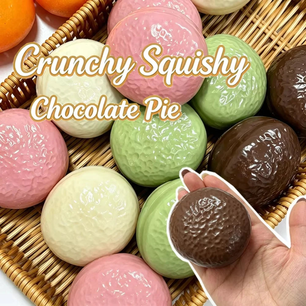Chocolate pie crunch squishies in a basket, pastel green, pink and brown shells